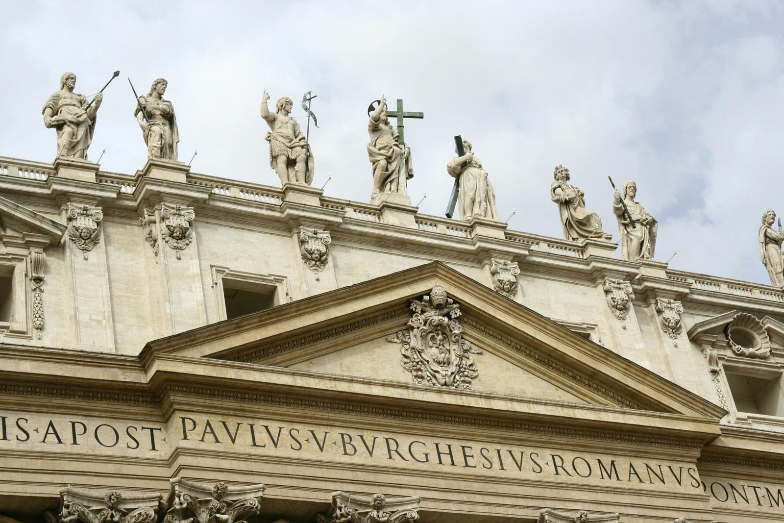 Statues adorning the facade of St. Peter's Basilica in Vatican City, a UNESCO World Heritage Site.